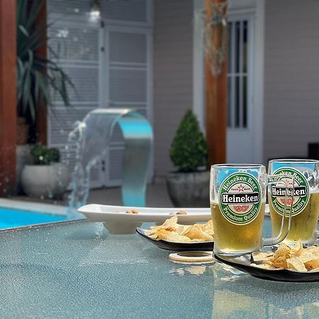 Casa agradável com piscina, a poucos passos da Praia Peruíbe Exterior foto