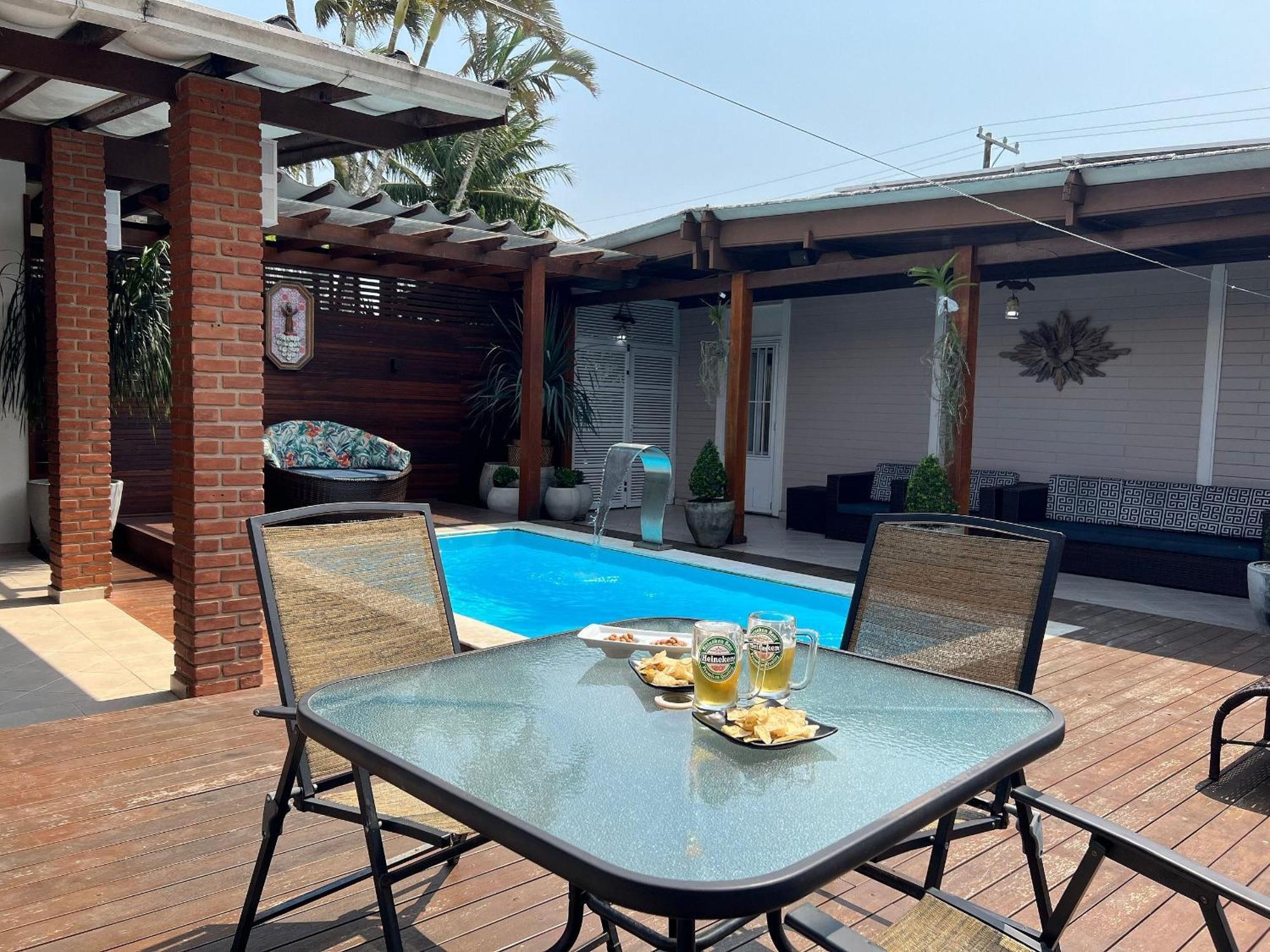 Casa agradável com piscina, a poucos passos da Praia Peruíbe Exterior foto