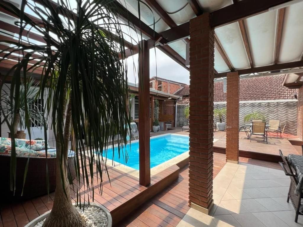 Casa agradável com piscina, a poucos passos da Praia Peruíbe Exterior foto